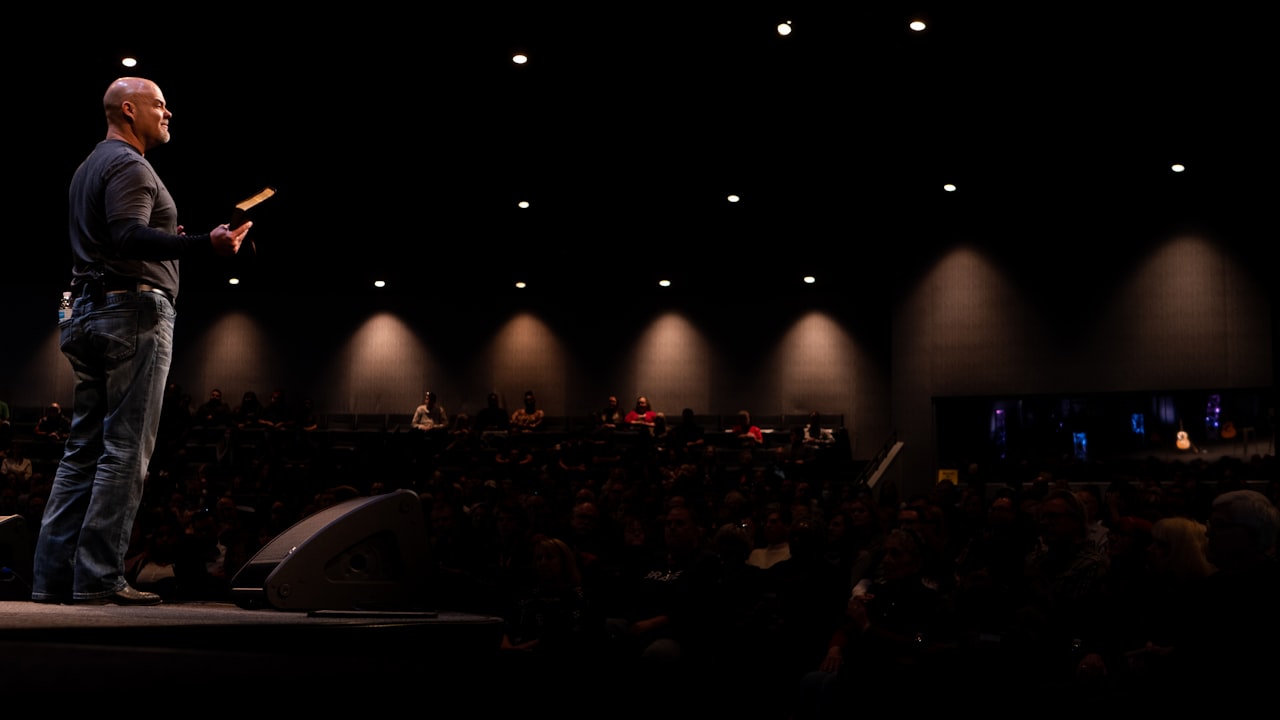 Congregation attending a church service with stage presentation